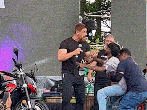 Fan dodged security to meet John Abraham: When bodyguard caught him, the actor stopped him and met him, watch video